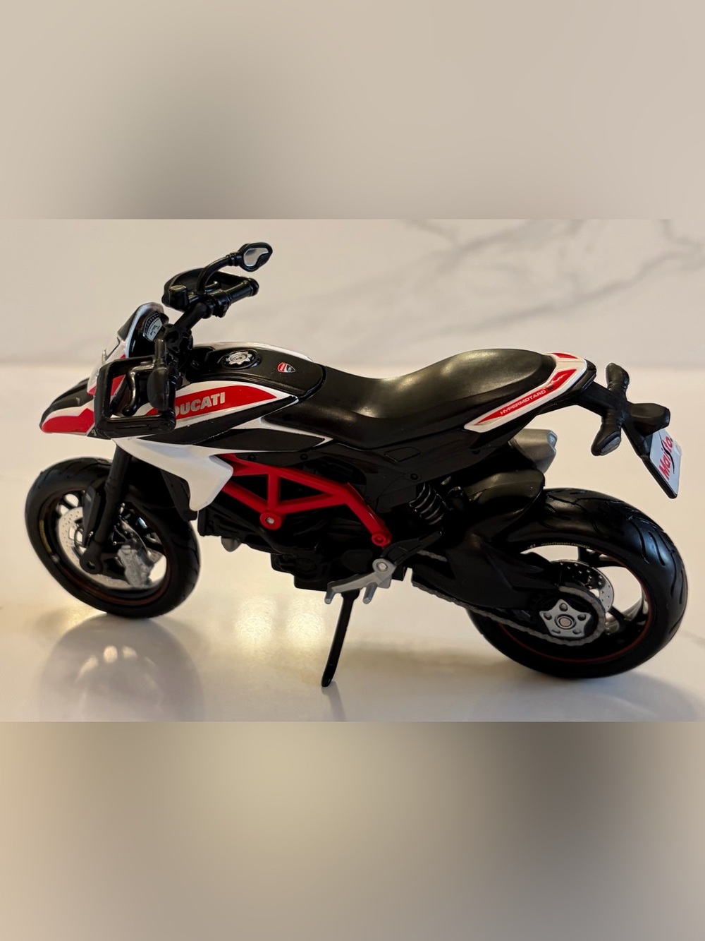 2013 Ducati Hypermotard SP White with Black and Red Stripes 1/12 Diecast